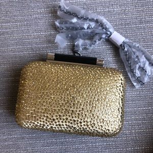 DVF Tonda clutch gold pave and black leather.